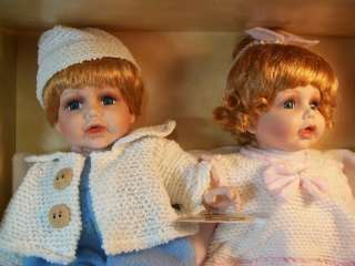 PORCELAIN BOY AND GIRL BABY DOLLS IN ORIGINAL BOX  