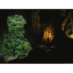  Two Men Explore a Fluvial Cave in a Mogote Stretched 