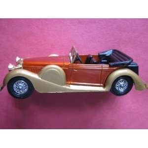  1938 Lagonda Drophead Coupe (copper/gold chasis/24 spokes 