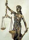 lady scales of justice lawyer firm attorney statue office desk