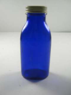 blue Bottle with lid (has M on the bottom)  