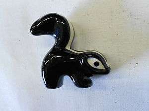 Vintage Ceramic Skunk Figurine. Stands out. Nice Condition Free 