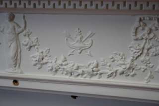 Made from pine with Gesso mouldings in the manner of Adams, this is a 