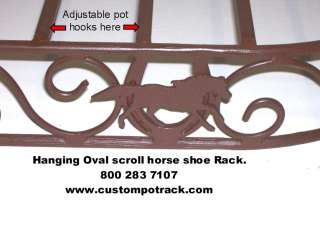 Hanging oval scroll horse & horse shoe pot rack  