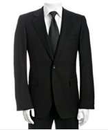 Gucci black striped 2 button suit with flat front trousers vs. Vera 